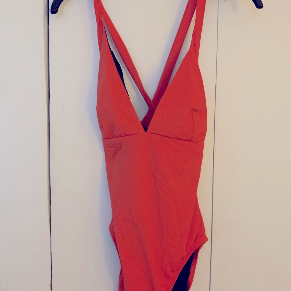 Burnt orange one piece swim suit. Great  quality